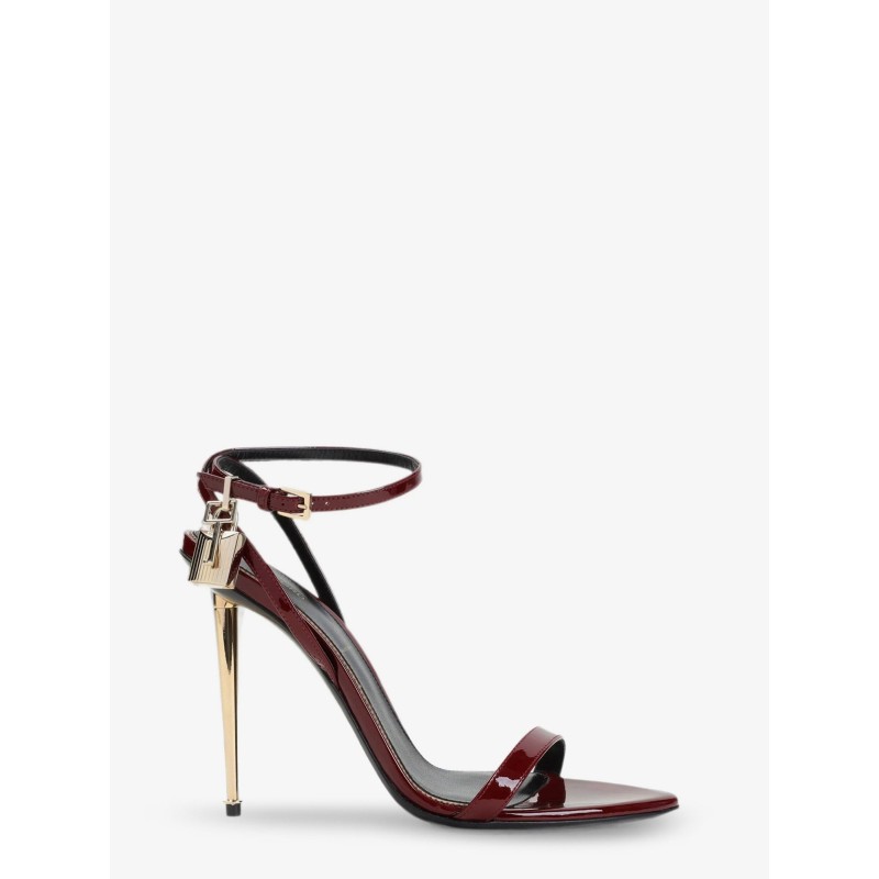 Patent leather sandals with iconic metal padlock