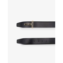 Leather belt with metal logo buckle
