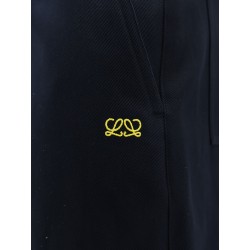 Denim trousers with contrasting embroidered logo