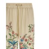 Flora and fauna printed trousers