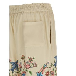 Flora and fauna printed trousers