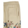 Flora and fauna printed trousers