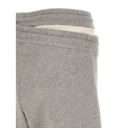 Asymmetrical double waist trousers