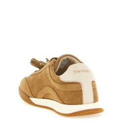 Suede sneakers with tassels