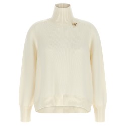 Knot pin sweater