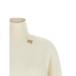 Knot pin sweater