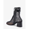 55 mesh and patent leather boots