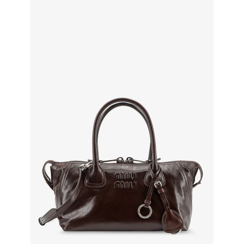 Leather handbag with embossed lettering logo