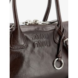 Leather handbag with embossed lettering logo