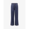 Jeans with adjustable drawstring
