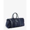 Nylon travel bag with leather inserts