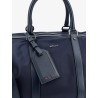 Nylon travel bag with leather inserts