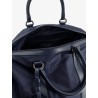 Nylon travel bag with leather inserts