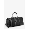 Nylon travel bag with leather inserts