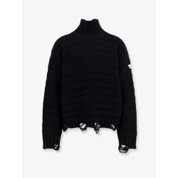 Wool blend sweater with distressed effect