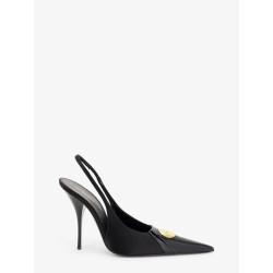 Louis patent leather pumps with logo tag