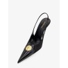 Louis patent leather pumps with logo tag