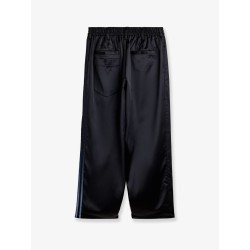 Technical fabric trousers with iconic side stripes