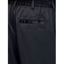 Technical fabric trousers with iconic side stripes