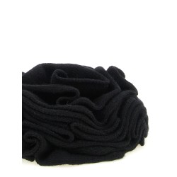 Knitted brooch with lace