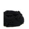 Knitted brooch with lace