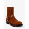 Suede boots with metal lettering logo