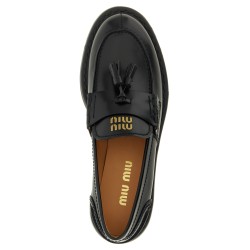 Loafers with tassels