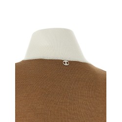 Sweater with perforated intarsia